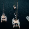 An odyssey Boston yacht experience along the illuminated harbor skyline